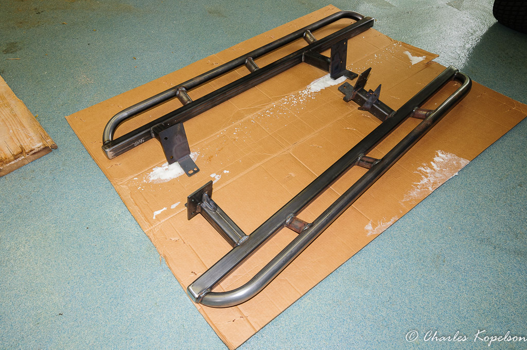 Lay out the parts on the flattened box to prep for paint. I like to paint these myself because they always get hit offroad and touching up paint  is easier than powdercoat. If you get the powdercoated parts they are hard to touch up. I'm not worried about getting a concours paintjob.