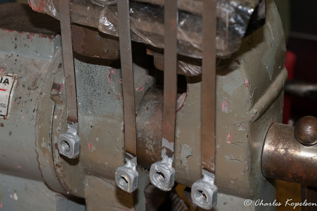 I cleaned up and painted the stick nuts too keep them from rusting. These allow you to position a nut in the frame to mate with a bolt.