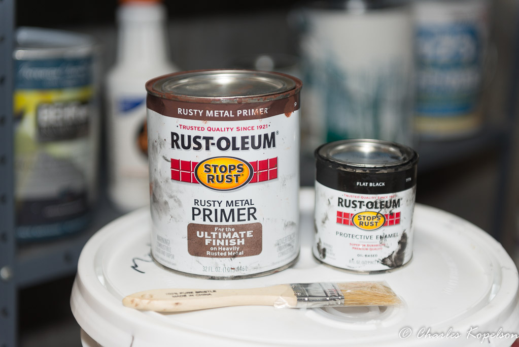 I like to use oil base heavy primer and oil base black. The skids don't show and will get all scratched up.  Every fall clean the bottom and slap some paint on the scratches with a cheap throw away brush.