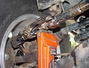 Unscrew the rod with a pipewrench