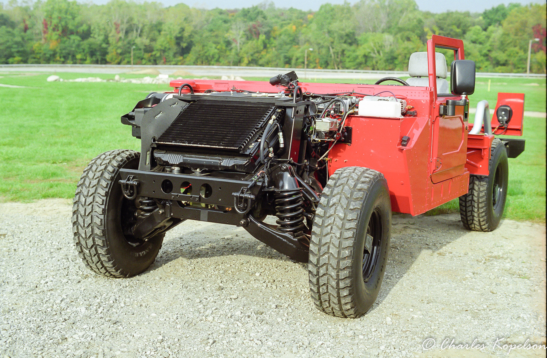 I was at the AMG test track in Mishawaka, IN and they had this rolling chassis cutaway hummer on display.  You can see a lot of internal parts and where lines and wiring run.