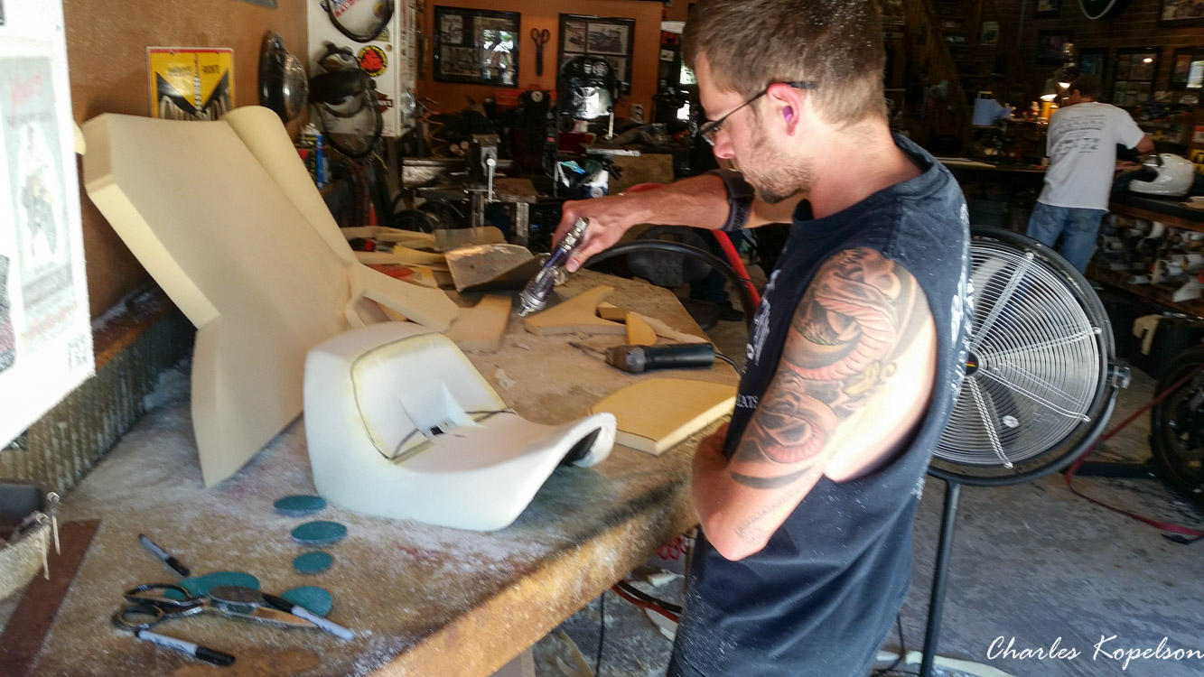 I waited about 5 weeks to get an appointment for a custom seat fitting at Bitchin Stitchin in Lakewood Colorado. They tie the bike upright. You sit on the bike and they look at your posture. The seat is removed  from my 2014 Harley Davidson Night Rod Special VRSCDX.