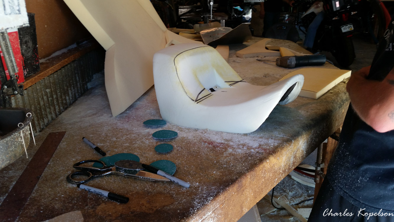 I waited about 5 weeks to get an appointment for a custom seat fitting at Bitchin Stitchin in Lakewood Colorado. They tie the bike upright. You sit on the bike and they look at your posture. The seat is removed  from my 2014 Harley Davidson Night Rod Special VRSCDX.