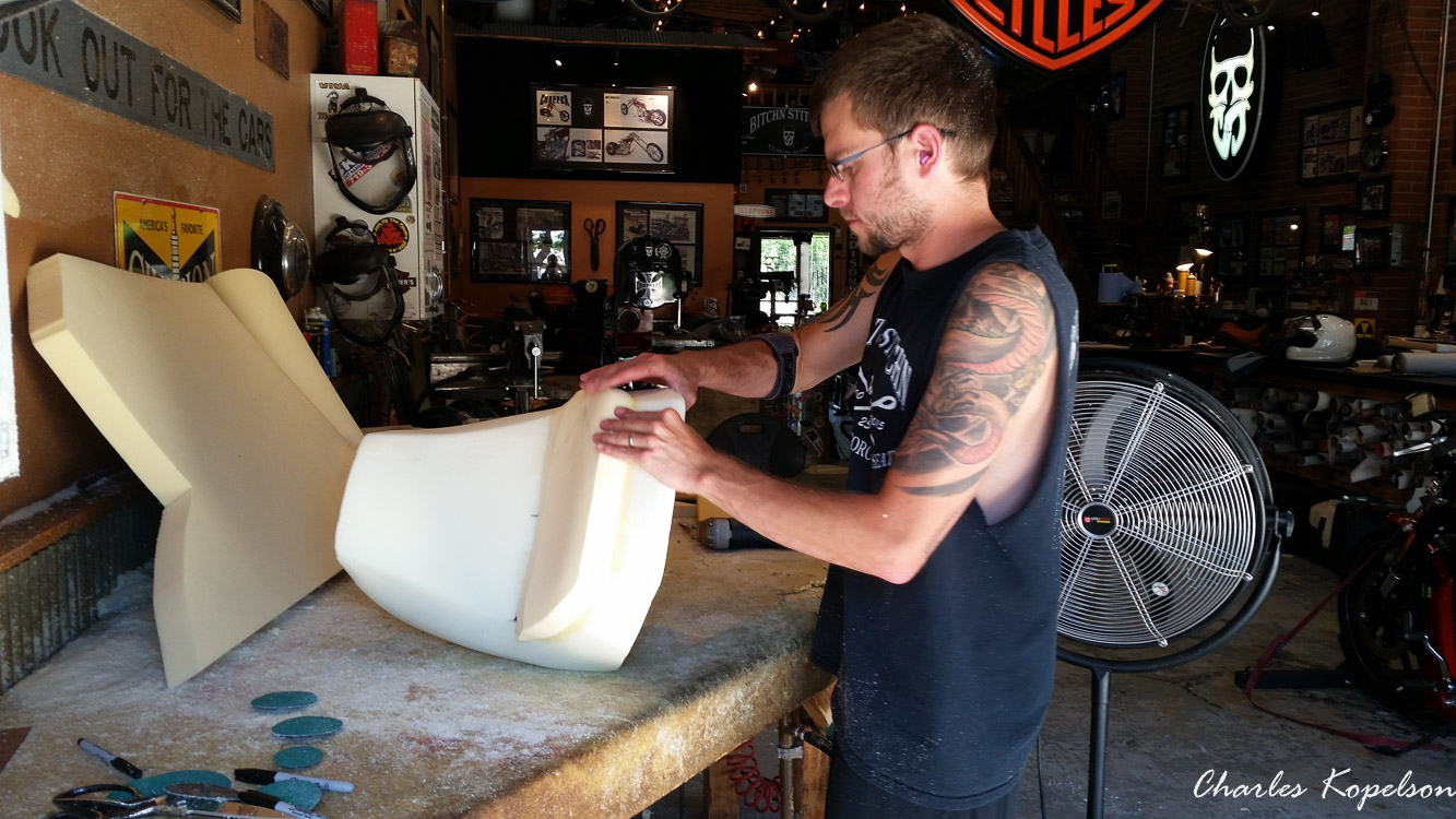 I waited about 5 weeks to get an appointment for a custom seat fitting at Bitchin Stitchin in Lakewood Colorado. They tie the bike upright. You sit on the bike and they look at your posture. The seat is removed  from my 2014 Harley Davidson Night Rod Special VRSCDX.