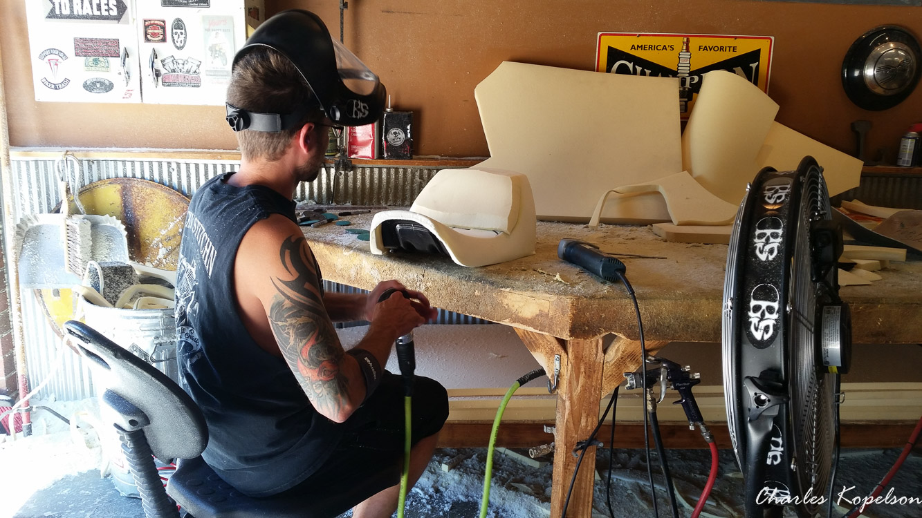 I waited about 5 weeks to get an appointment for a custom seat fitting at Bitchin Stitchin in Lakewood Colorado. They tie the bike upright. You sit on the bike and they look at your posture. The seat is removed  from my 2014 Harley Davidson Night Rod Special VRSCDX.