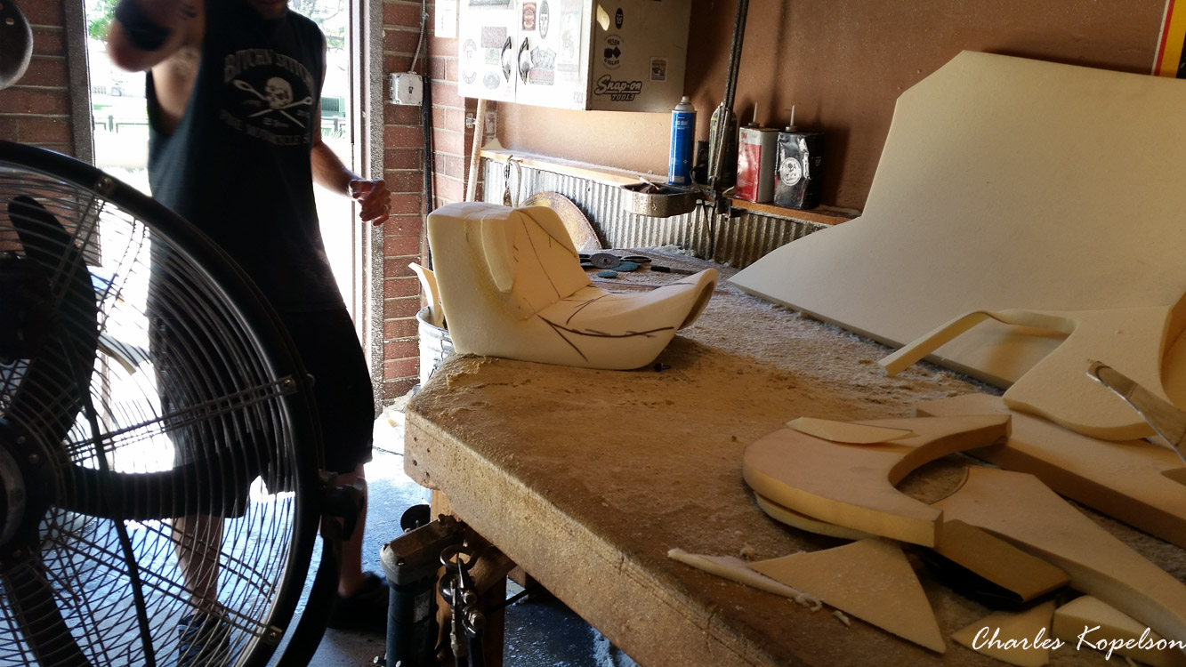 I waited about 5 weeks to get an appointment for a custom seat fitting at Bitchin Stitchin in Lakewood Colorado. They tie the bike upright. You sit on the bike and they look at your posture. The seat is removed  from my 2014 Harley Davidson Night Rod Special VRSCDX.