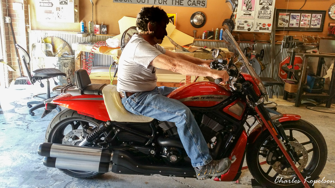 I waited about 5 weeks to get an appointment for a custom seat fitting at Bitchin Stitchin in Lakewood Colorado. They tie the bike upright. You sit on the bike and they look at your posture. The seat is removed  from my 2014 Harley Davidson Night Rod Special VRSCDX.