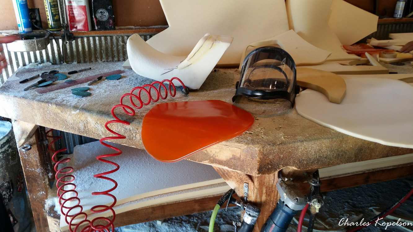I waited about 5 weeks to get an appointment for a custom seat fitting at Bitchin Stitchin in Lakewood Colorado. They tie the bike upright. You sit on the bike and they look at your posture. The seat is removed  from my 2014 Harley Davidson Night Rod Special VRSCDX.