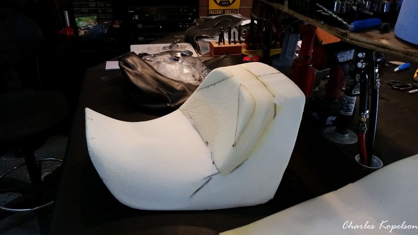 I waited about 5 weeks to get an appointment for a custom seat fitting at Bitchin Stitchin in Lakewood Colorado. They tie the bike upright. You sit on the bike and they look at your posture. The seat is removed  from my 2014 Harley Davidson Night Rod Special VRSCDX.