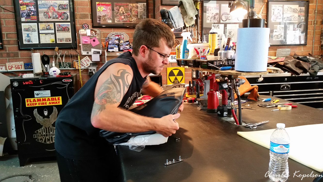 I waited about 5 weeks to get an appointment for a custom seat fitting at Bitchin Stitchin in Lakewood Colorado. They tie the bike upright. You sit on the bike and they look at your posture. The seat is removed  from my 2014 Harley Davidson Night Rod Special VRSCDX.