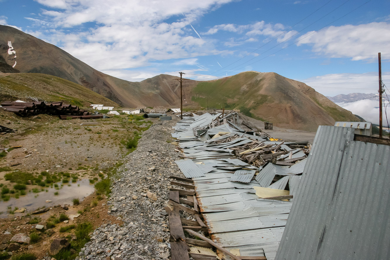 Collapsed enclosed pathway to the mine entrance.